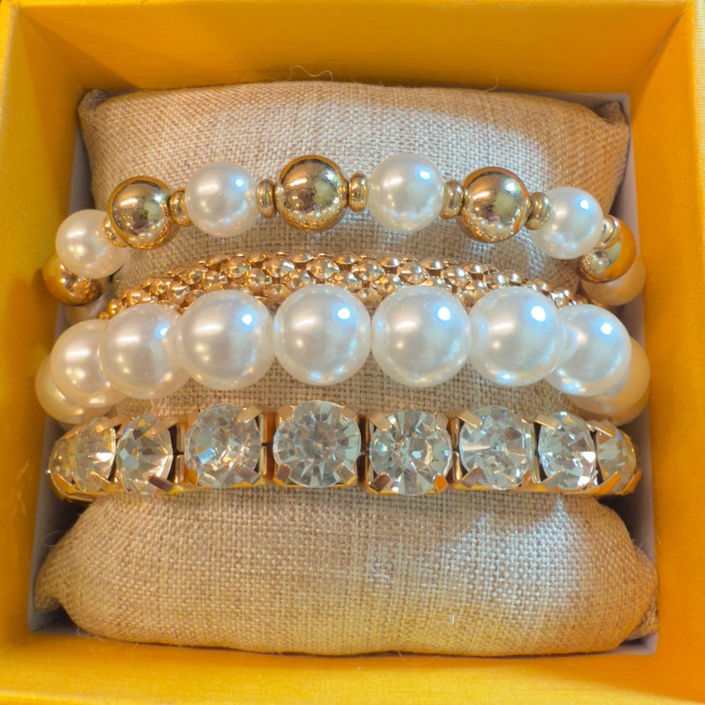 Nicole Miller Gold and White Pearl Bracelet Set